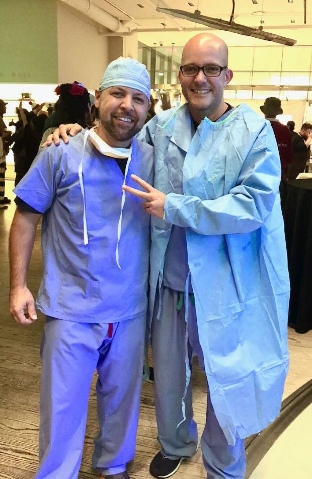 Two of the GGS Diagnostics team in theatre scrubs